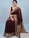 Mannequin wearing coffee-brown khaddi georgette saree