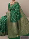 Mannequin wearing green pure Chiniya silk saree