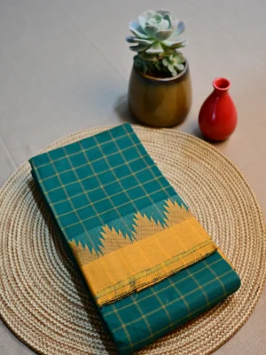 Green cotton saree with yellow border and checks.