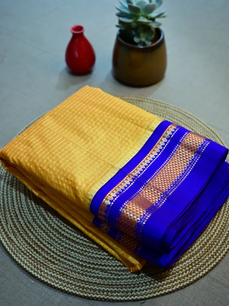 Mango yellow pure silk Irkal saree with royal blue border and small golden checks