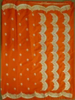 Pallu of orange Mashru silk saree with golden border