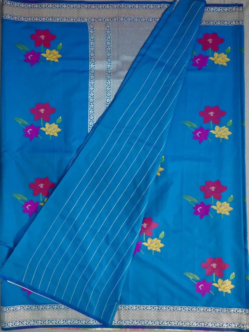 Blouse of peacock blue semi Katan saree