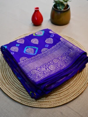 Purple pure Chiniya silk saree with golden border