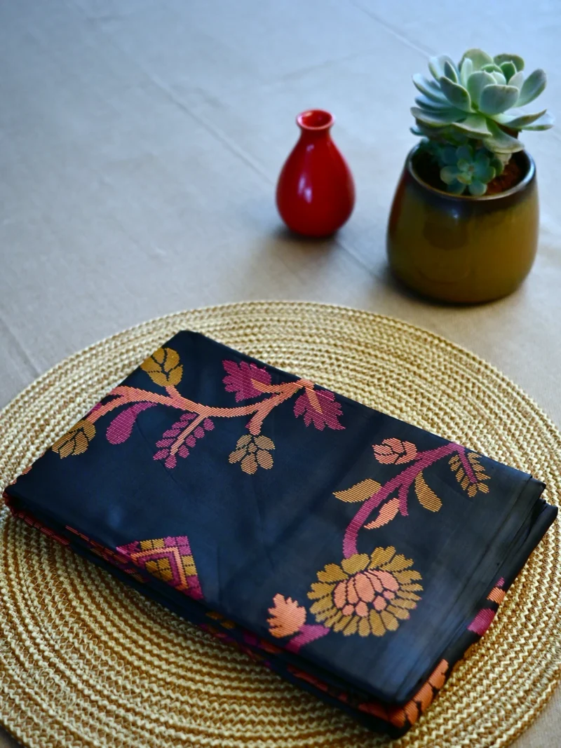 Black Jamdani print silk cotton saree.