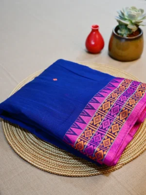 Blue Dongri Khadi cotton saree with pink border.