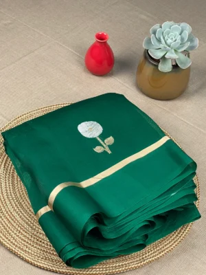 Green pure organza saree with gold and silver butti