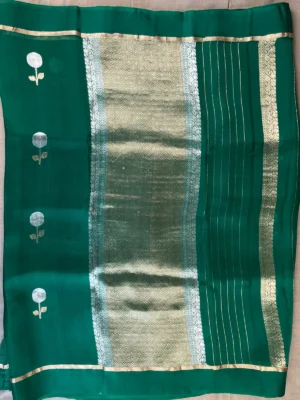 Pallu of green pure organza saree