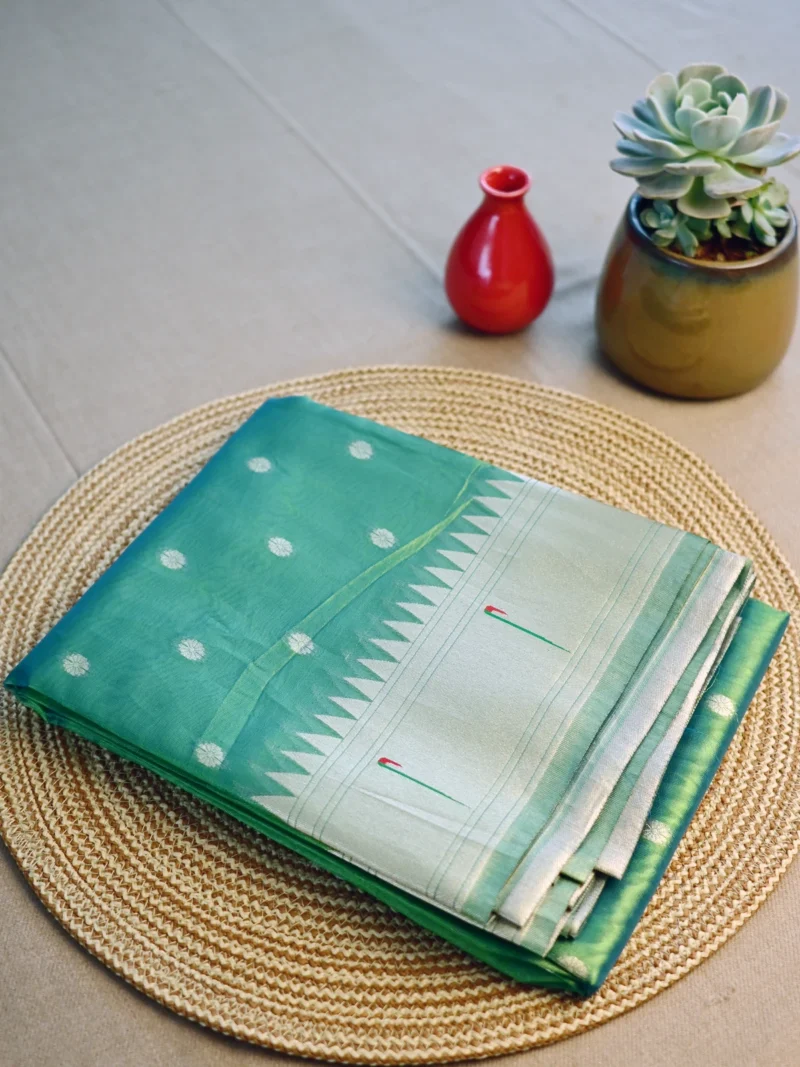 Green tissue Paithani saree with golden butti.