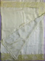 Blouse of light mehndi green soft Organza saree.