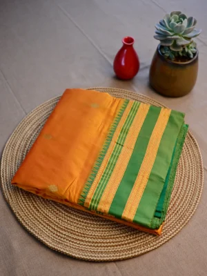 Mango yellow pure silk Narayan Peth saree with green border.