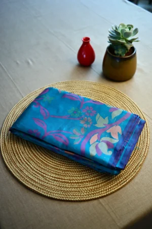 Peacock blue Jamdani print silk cotton saree.
