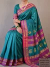 Mannequin wearing peacock green pure silk Narayan Peth saree