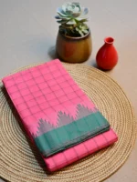 Pink cotton saree with green border.