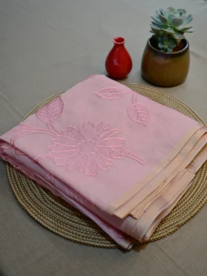 Pink Kota cotton saree with applique work.