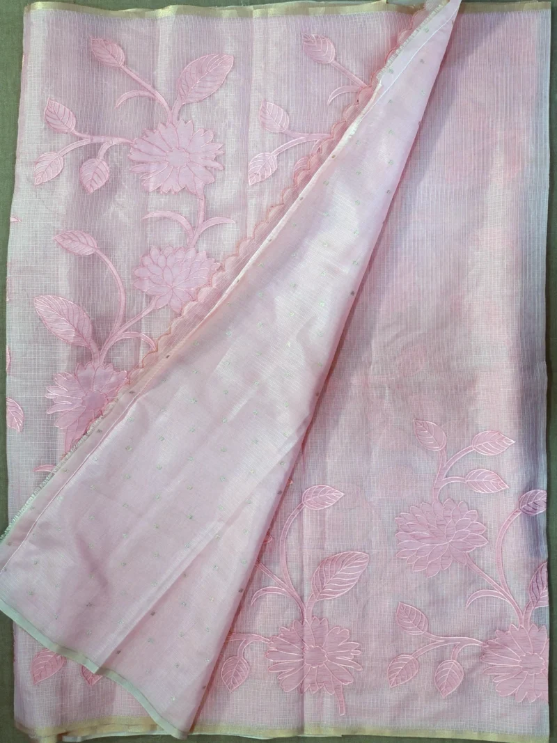 Blouse of pink Kota cotton saree with applique work.