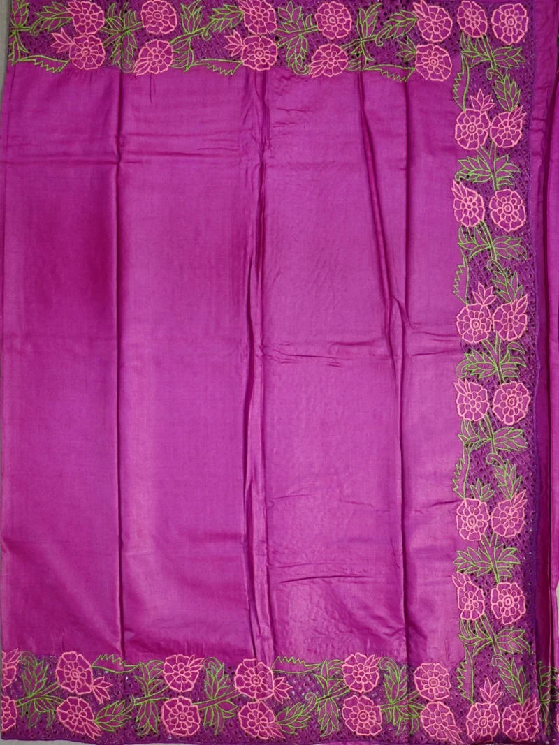 Pallu of wine pink pure tussar silk saree with cutwork embroidery