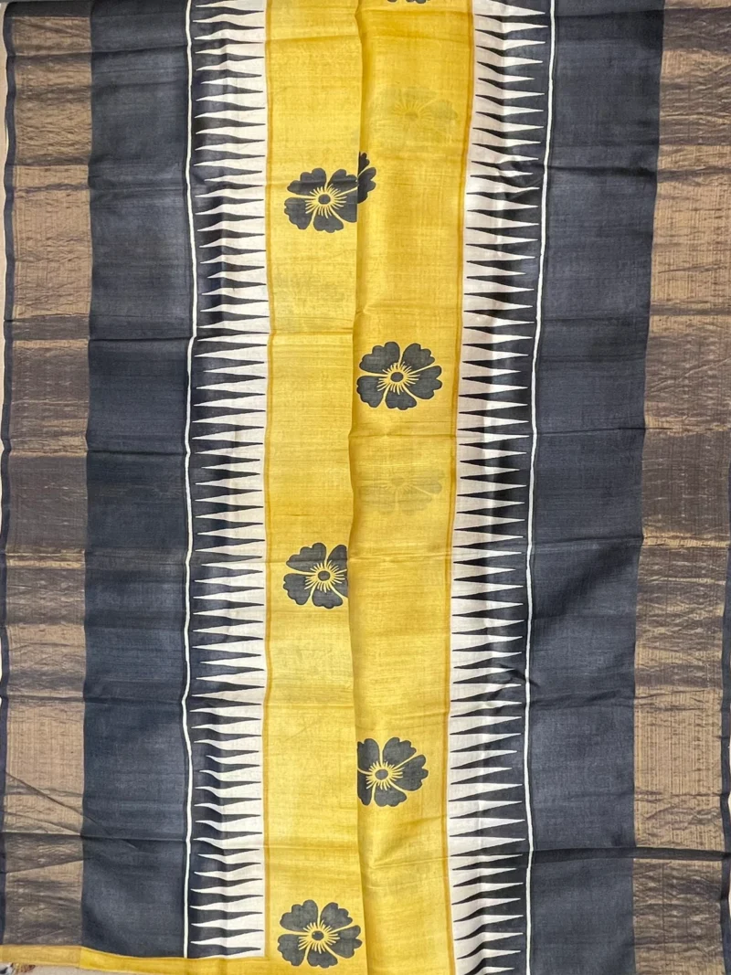 Full body view of yellow pure Tussar silk saree.