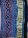 Pallu of blue-grey printed modal saree
