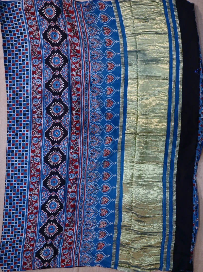 Pallu of blue-grey printed modal saree