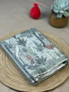 Pista green art silk saree with Kalamkari design along the border and on pallu