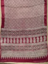 Pallu of maroon printed modal saree
