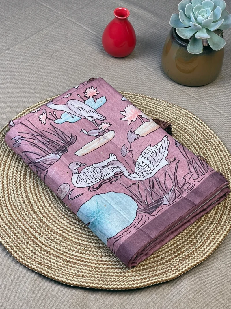 Onion pink art silk saree with Kalamkari design along the border and on pallu