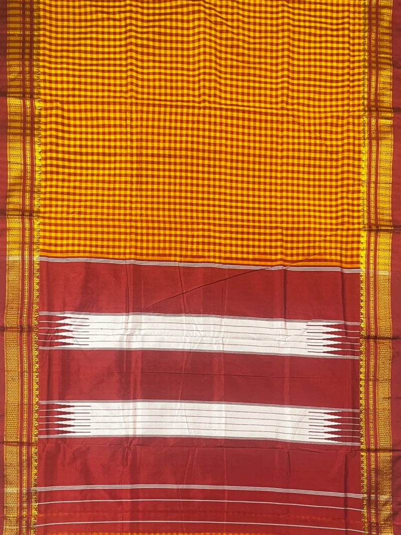 Pallu of yellow cotton Ilkal saree with maroon checks