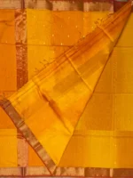 Orange-shaded-Maheshwari silk-cotton-blouse Blouse of orange Shaded Maheshwari silk-cotton saree with butti