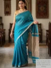 Mannequin wearing blue silk cotton Maheshwari saree with thread lines