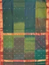 Pallu of green Shaded Maheshwari silk-cotton saree with butti