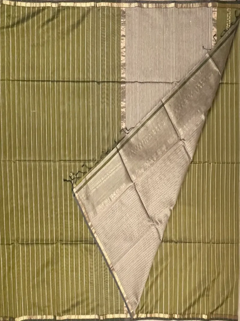 Blouse of olive green Maheshwari silk cotton saree with thread lines