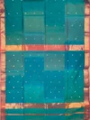 Pallu of peacock blue Shaded Maheshwari silk-cotton saree with butti