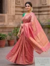 Mannequin wearing pink plain tissue-cotton Maheshwari saree