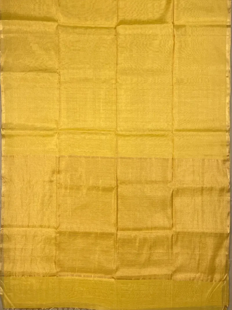 Pallu of yellow plain tissue-cotton Maheshwari saree