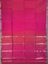 Pallu of A silk‑cotton Maheshwari saree with shades of magenta, blending heritage and modern elegance. The beauty of plain saree is accentuated by a narrow blue border with golden jari. A coordinated pallu highlights its elegance. Paired with a matching blouse piece, it’s a luxurious, tasteful choice for festive occasions and family gatherings.