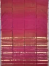 Pallu of Maroon shaded plain silk-cotton Maheshwari saree