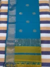 Pallu of Mustard yellow silk-cotton Maheshwari saree with flower butti and contrast pallu